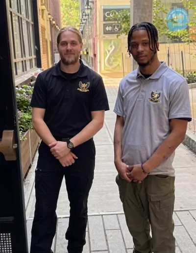 saul investigations security guards outside building